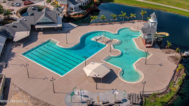 1911 Salt Creek Dr, Fleming Island, FL 32003 - community pool with a water play area, a water slide, a patio, and a water view