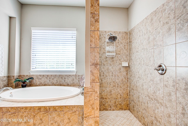 1911 Salt Creek Dr, Fleming Island, FL 32003 - bathroom featuring a garden tub and tiled shower