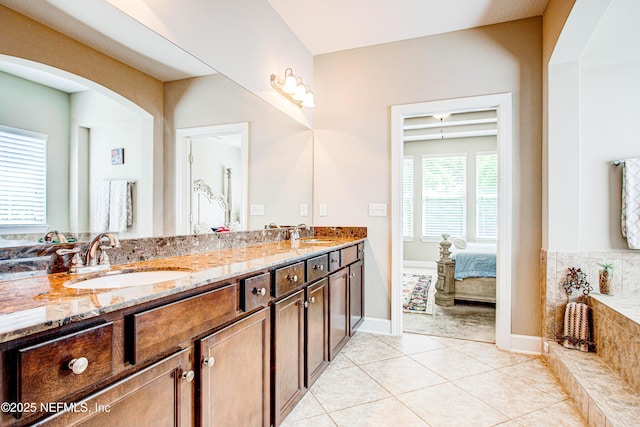 1911 Salt Creek Dr, Fleming Island, FL 32003 - full bath featuring ensuite bath, tile patterned floors, a sink, and double vanity