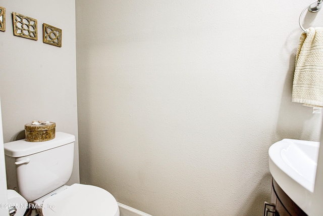 1911 Salt Creek Dr, Fleming Island, FL 32003 - half bath featuring baseboards, toilet, and vanity