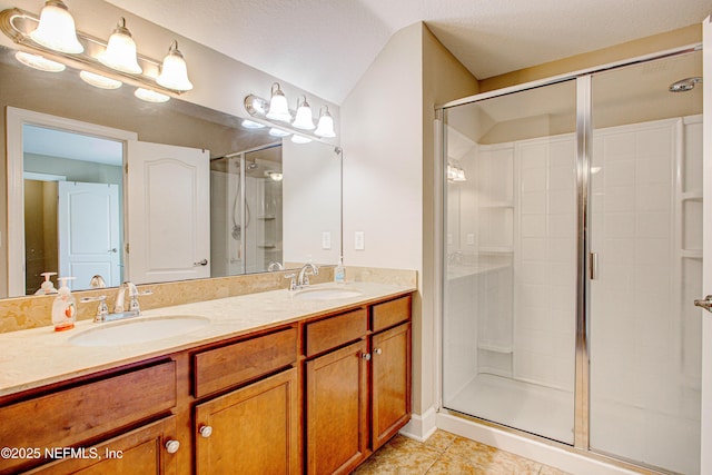 1911 Salt Creek Dr, Fleming Island, FL 32003 - bathroom with tile patterned flooring, a sink, and a stall shower