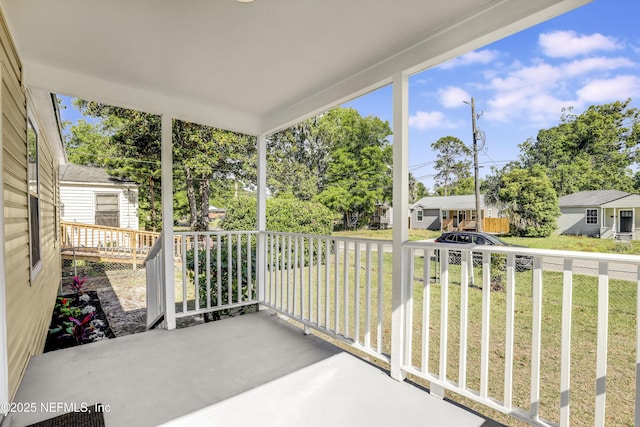 5246 Sunderland Rd, Jacksonville, FL 32210 - balcony featuring covered porch