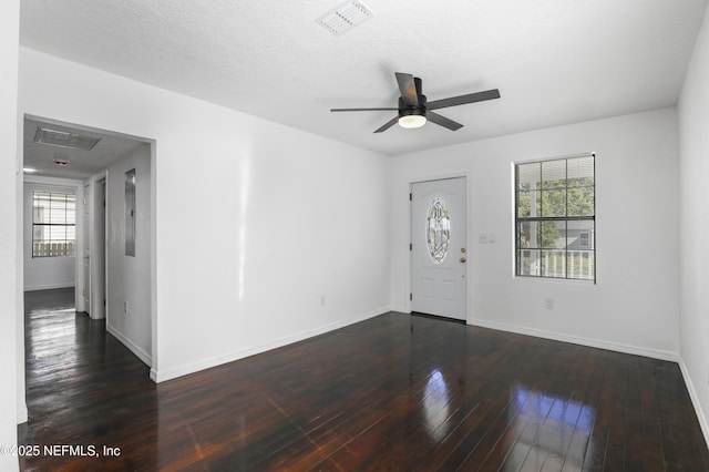 5246 Sunderland Rd, Jacksonville, FL 32210 - foyer entrance with hardwood / wood-style floors, visible vents, a ceiling fan, and baseboards