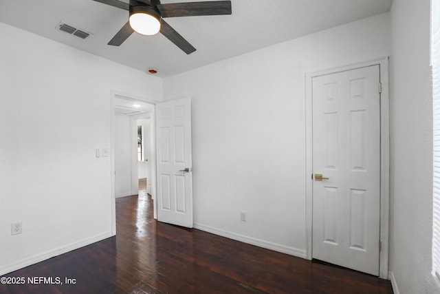 5246 Sunderland Rd, Jacksonville, FL 32210 - unfurnished bedroom featuring baseboards, visible vents, a ceiling fan, and hardwood / wood-style flooring