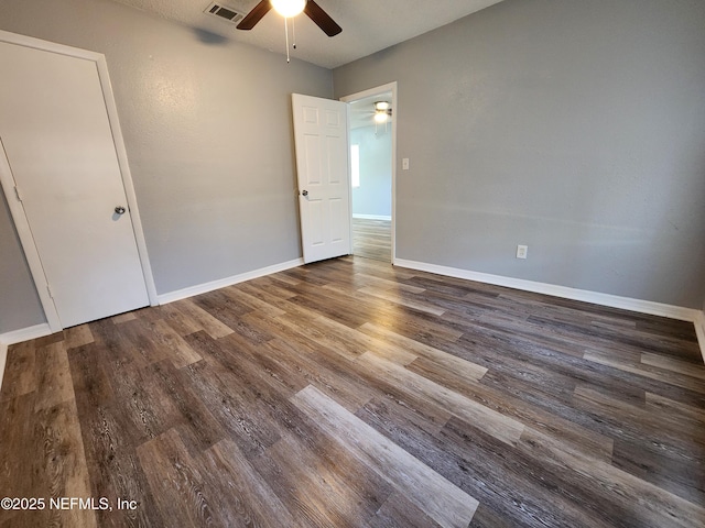 860 Westbrook Rd, Jacksonville, FL 32209 - unfurnished bedroom featuring visible vents, baseboards, a ceiling fan, and wood finished floors