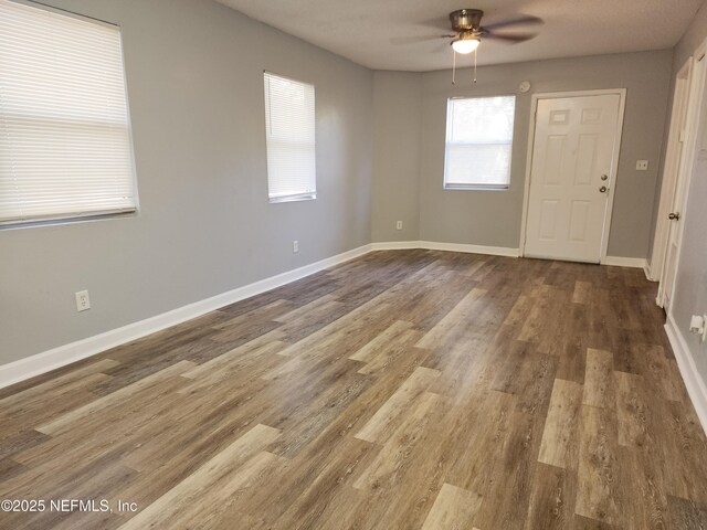 860 Westbrook Rd, Jacksonville, FL 32209 - empty room featuring wood finished floors, baseboards, and a ceiling fan