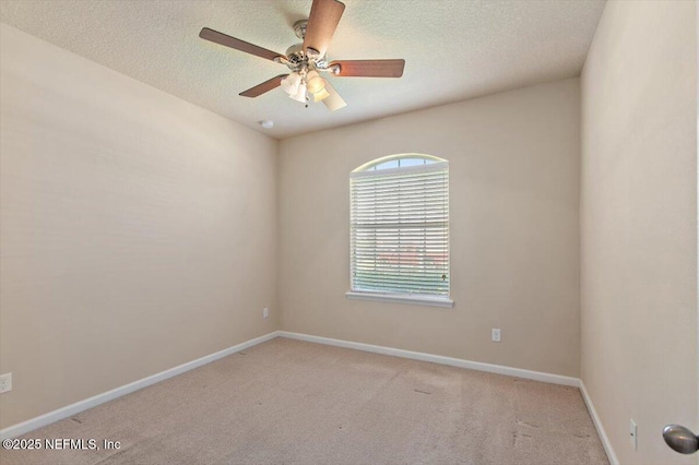 13644 Goodson Pl, Jacksonville, FL 32226 - carpeted spare room with a textured ceiling, a ceiling fan, and baseboards