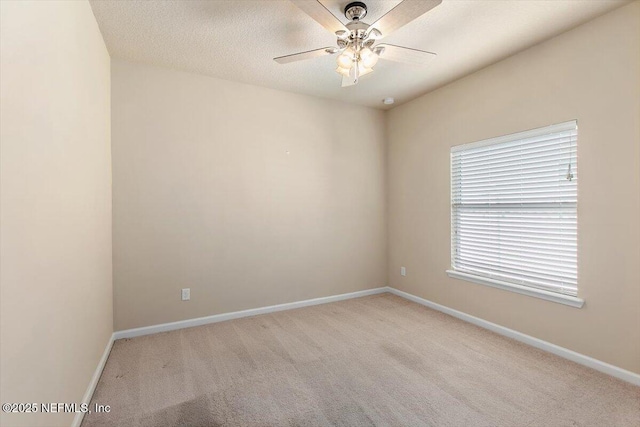 13644 Goodson Pl, Jacksonville, FL 32226 - unfurnished room with light carpet, a ceiling fan, and baseboards