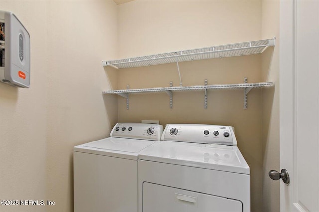 13644 Goodson Pl, Jacksonville, FL 32226 - clothes washing area with separate washer and dryer and laundry area