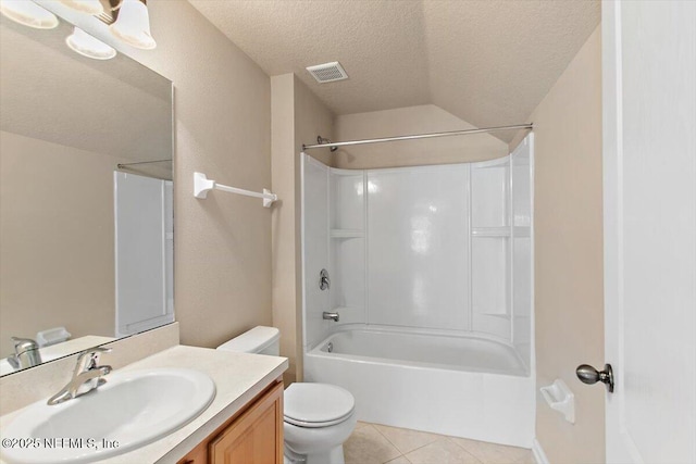 13644 Goodson Pl, Jacksonville, FL 32226 - full bathroom with a textured ceiling, toilet, visible vents, tile patterned flooring, and vanity