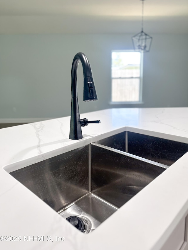 112 Moseley Ave, Palatka, FL 32177 - kitchen view of a sink and light stone countertops