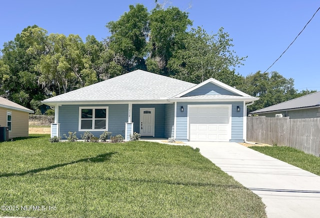 112 Moseley Ave, Palatka, FL 32177 - ranch-style home featuring an attached garage, concrete driveway, cooling unit, and covered porch