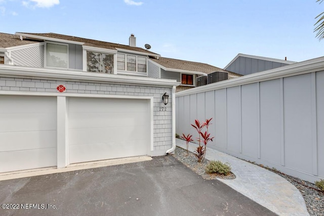 exterior space featuring driveway