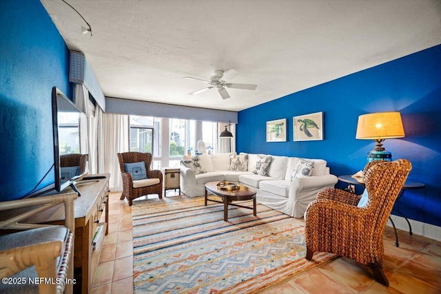 272 Deer Run Ln, Ponte Vedra Beach, FL 32082 - living room with a ceiling fan and light tile patterned floors