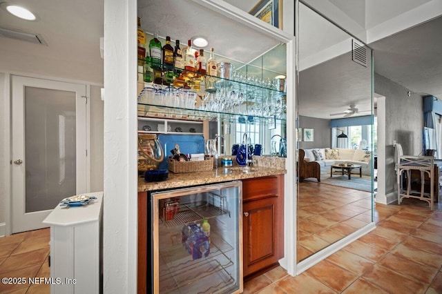 272 Deer Run Ln, Ponte Vedra Beach, FL 32082 - indoor dry bar featuring beverage cooler, light tile patterned floors, and ceiling fan