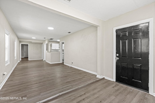 5741 Castellano Ave, Jacksonville, FL 32208 - foyer featuring baseboards, wood finished floors, and recessed lighting