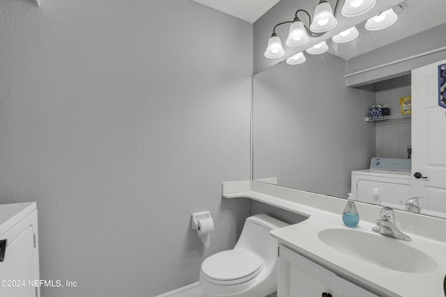 half bath featuring toilet, vanity, and baseboards