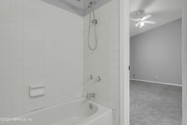 full bathroom with tub / shower combination, baseboards, and a ceiling fan