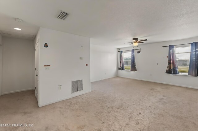 3410 Ridgeview Dr, Green Cove Springs, FL 32043 - empty room with light colored carpet, a ceiling fan, baseboards, and a smoke detector