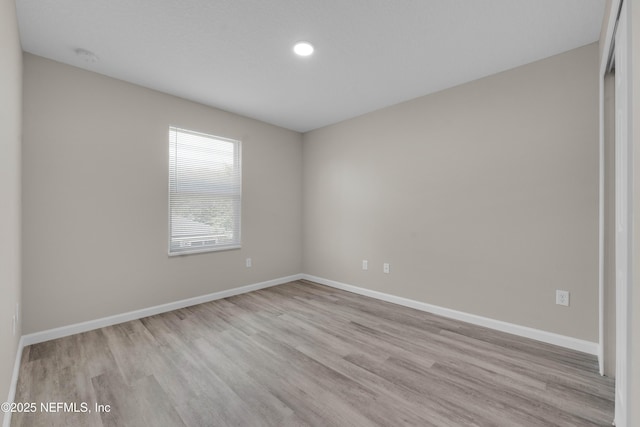12171 Calais St, Jacksonville, FL 32224 - spare room featuring baseboards and wood finished floors