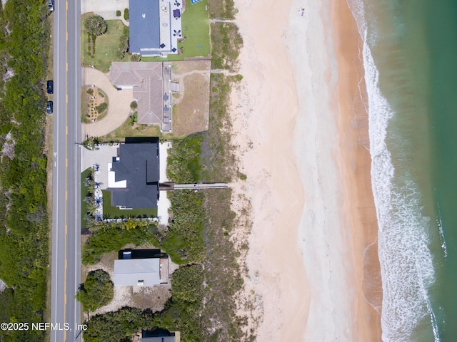 aerial view with a beach view and a water view