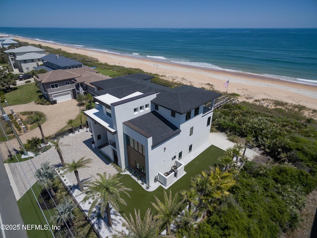 aerial view with a beach view and a water view