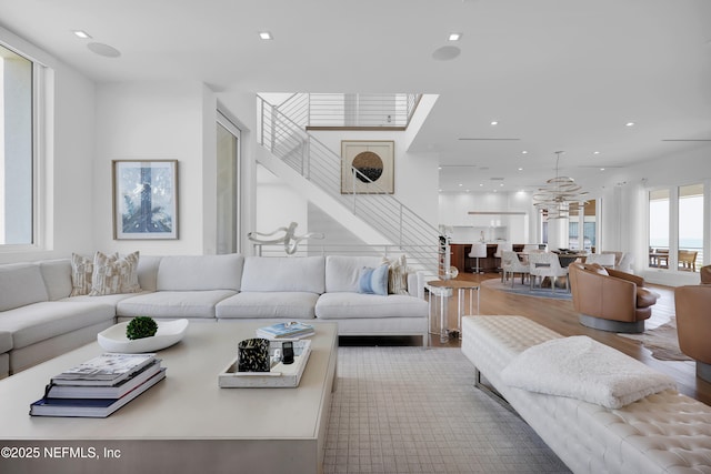 living room with recessed lighting and wood finished floors