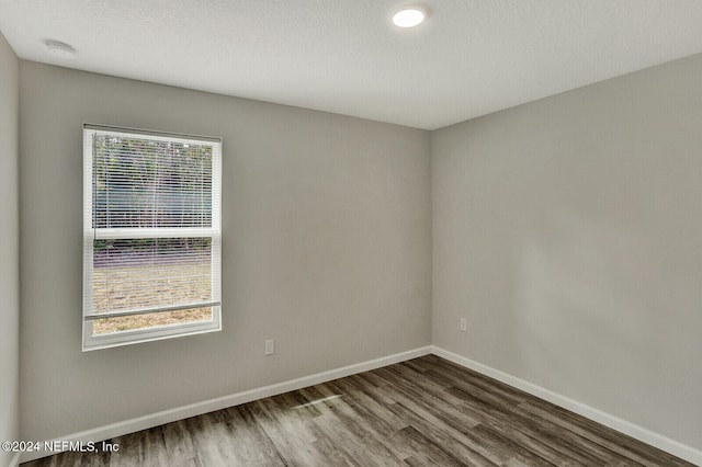 4375 Loys Dr, Jacksonville, FL 32246 - spare room featuring baseboards and wood finished floors