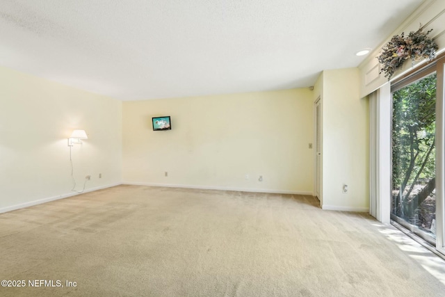 2815 Sylvan Ln S, Jacksonville, FL 32257 - unfurnished room with baseboards and light carpet