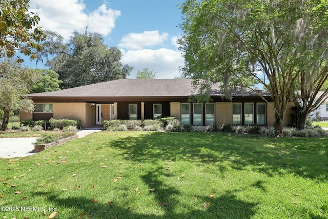 2815 Sylvan Ln S, Jacksonville, FL 32257 - view of front of house with a front lawn and brick siding