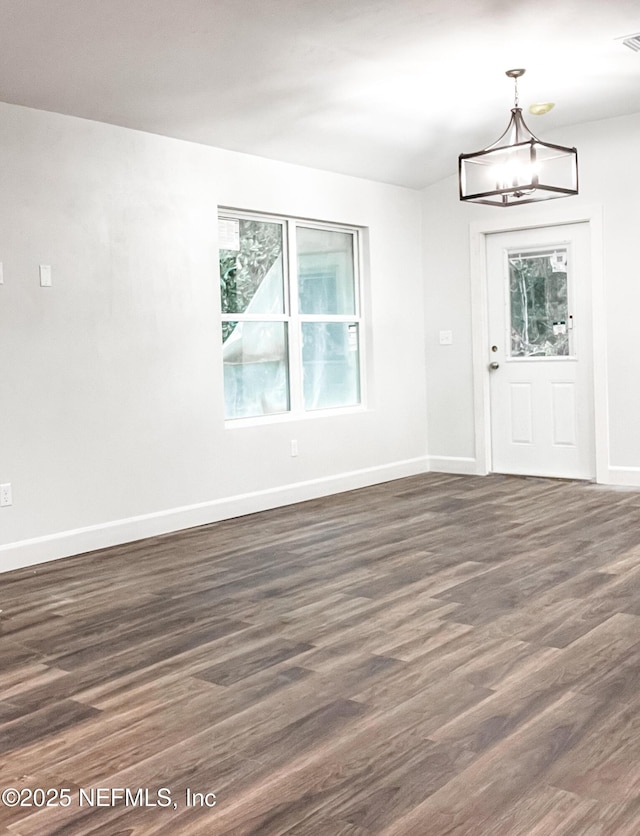 6333 Fox Hollow Ct, Hampton, FL 32044 - entryway featuring dark wood-style floors and a chandelier