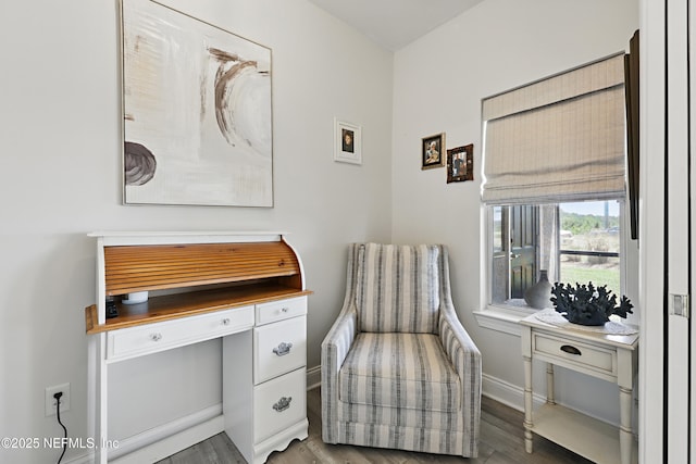 115 Legendary Dr Unit 106, Saint Augustine, FL 32902 - sitting room with baseboards and wood finished floors