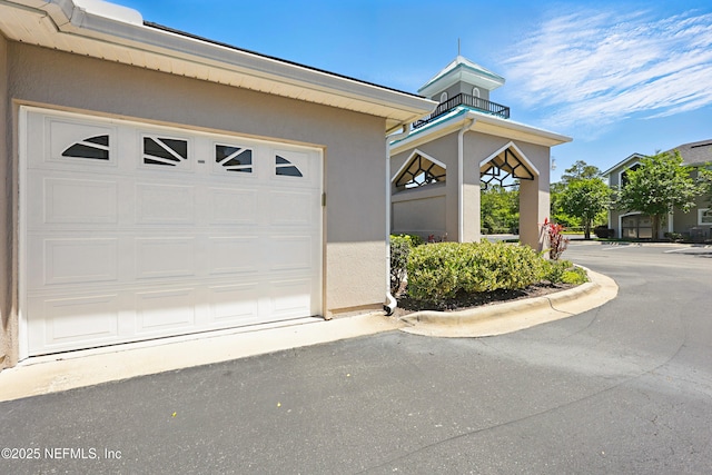 115 Legendary Dr Unit 106, Saint Augustine, FL 32902 - exterior space with a garage and stucco siding