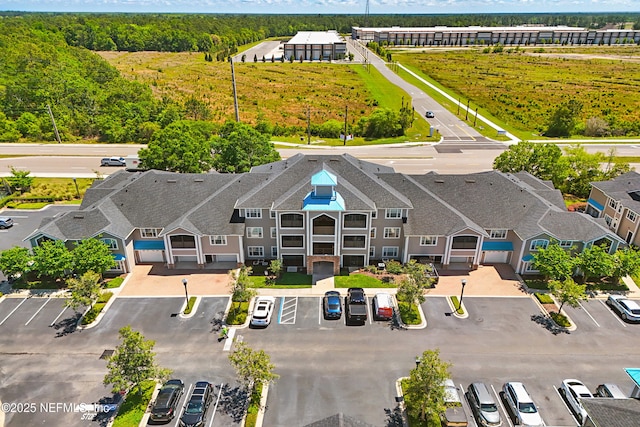 115 Legendary Dr Unit 106, Saint Augustine, FL 32902 - bird's eye view with a wooded view