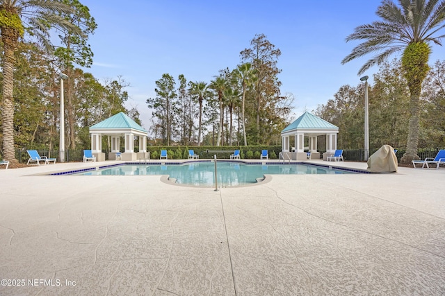 115 Legendary Dr Unit 106, Saint Augustine, FL 32902 - community pool with fence, a gazebo, and a patio area