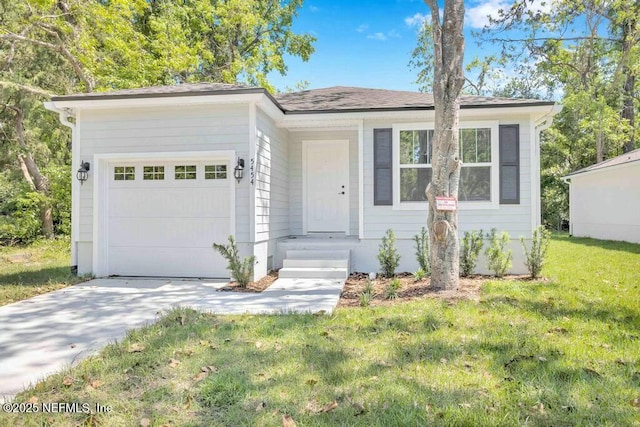 5454 Amazon Ave, Jacksonville, FL 32254 - ranch-style home with concrete driveway, an attached garage, and a front yard
