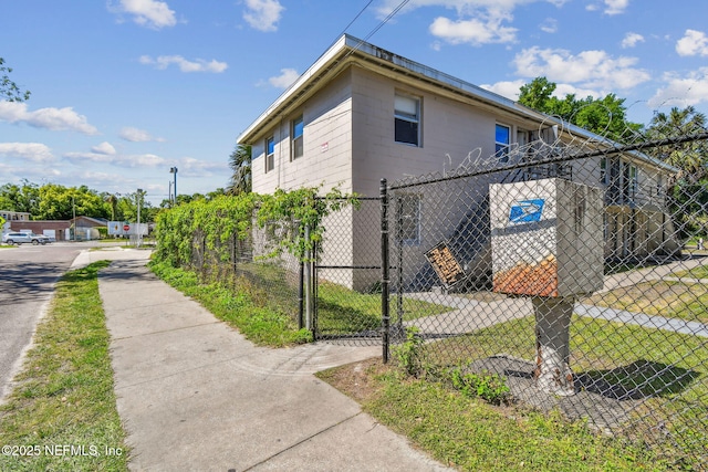 1330 Barnett St, Jacksonville, FL 32209 - view of home's exterior featuring a gate and fence