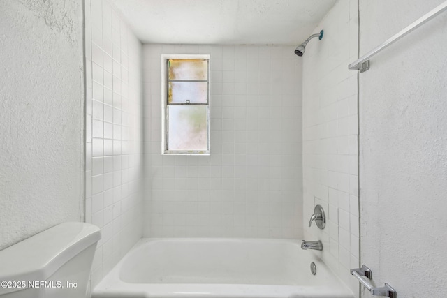 1330 Barnett St, Jacksonville, FL 32209 - full bath featuring a textured wall, toilet, and tub / shower combination