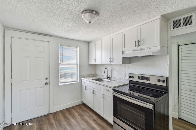 1330 Barnett St, Jacksonville, FL 32209 - kitchen featuring a textured ceiling, a sink, visible vents, stainless steel range with electric stovetop, and under cabinet range hood