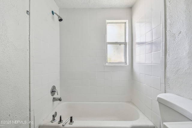 1330 Barnett St, Jacksonville, FL 32209 - full bath with a textured ceiling, a textured wall, toilet, and shower / bathtub combination