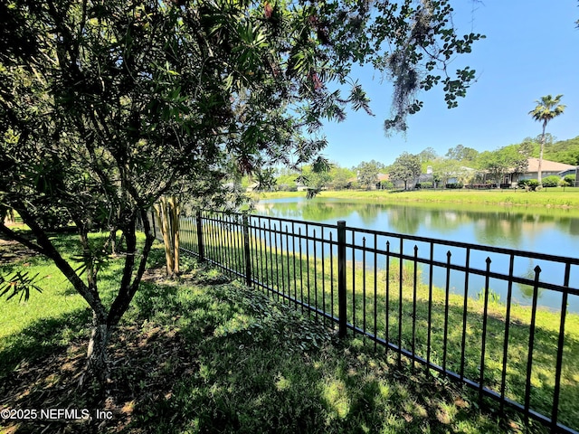 water view featuring fence