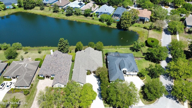 aerial view featuring a water view and a residential view