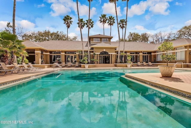 community pool with a patio