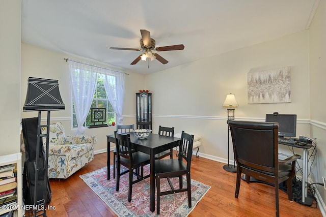 4334 Plaza Gate Ln S Unit 202, Jacksonville, FL 32217 - dining area with a ceiling fan, baseboards, and hardwood / wood-style floors