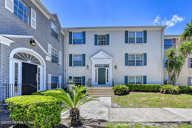 4334 Plaza Gate Ln S Unit 202, Jacksonville, FL 32217 - view of property featuring stucco siding