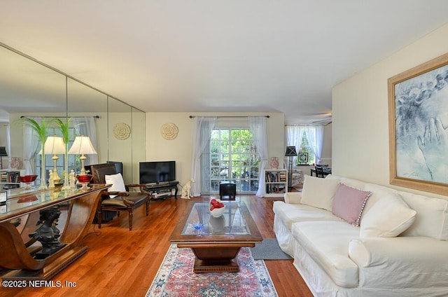 4334 Plaza Gate Ln S Unit 202, Jacksonville, FL 32217 - living room featuring wood finished floors