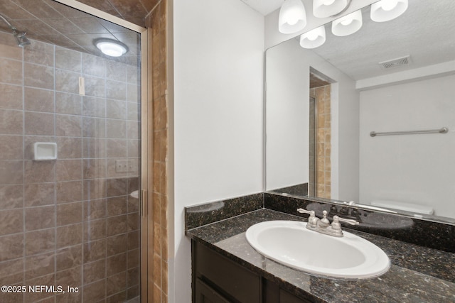 5375 Ortega Farms Blvd Unit 711, Jacksonville, FL 32210 - full bath featuring visible vents, vanity, and a stall shower