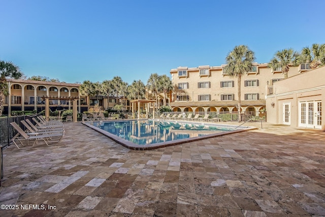 5375 Ortega Farms Blvd Unit 711, Jacksonville, FL 32210 - community pool featuring a patio area and french doors