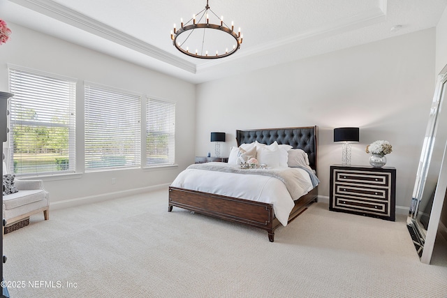 314 Freshwater Dr, Saint Johns, FL 32259 - carpeted bedroom with a raised ceiling, crown molding, baseboards, and an inviting chandelier