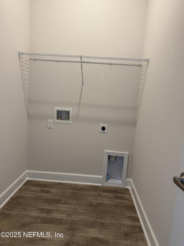 8340 Helmsley Blvd, Jacksonville, FL 32219 - washroom featuring washer hookup, dark wood-style floors, electric dryer hookup, and baseboards
